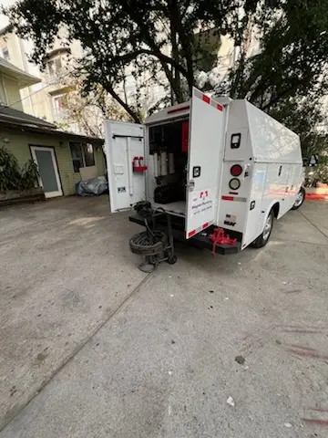 Magnet Plumbing service vehicle on-site for Water Heater Repair in Island Creek